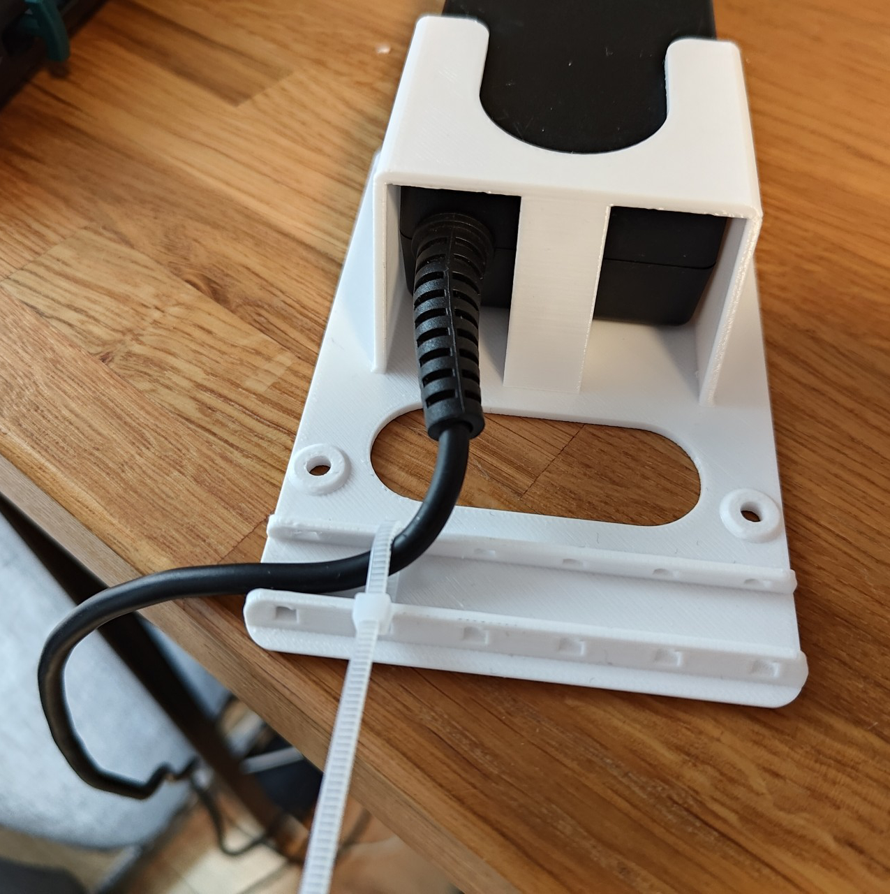 Zip tie to hold the cable in place. In hindsight: completely unnecessary.